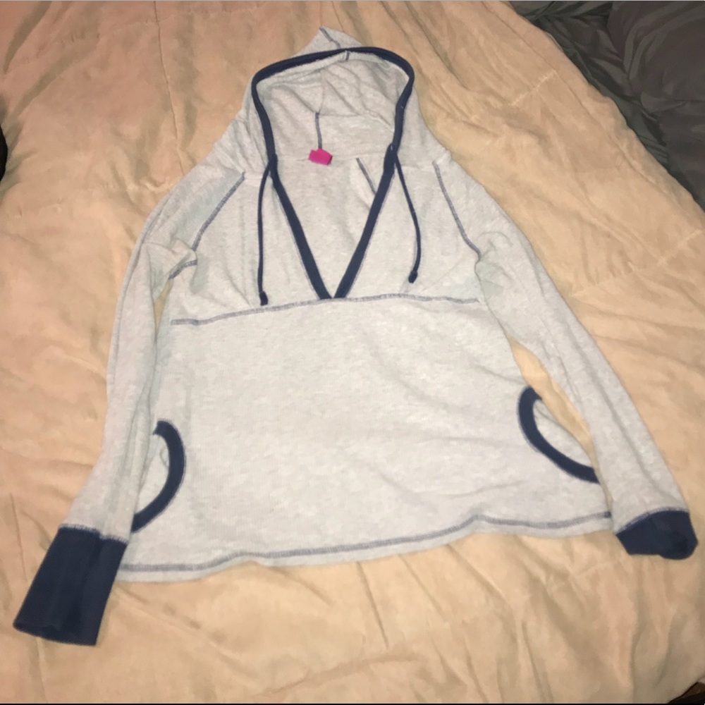 Like new long sleeve shirt with pock across front